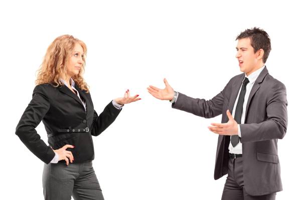Businesswoman having an argument with a young businessman
